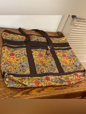 Braciano travel tote with birds, flowers, butterflies motif